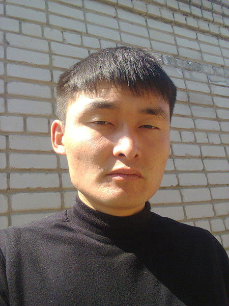 Куан Абикеев