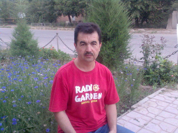 Атхам Козихонов