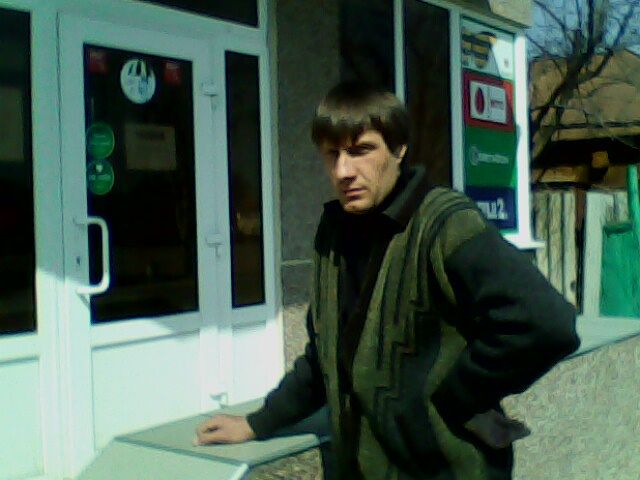 Александр Олейник