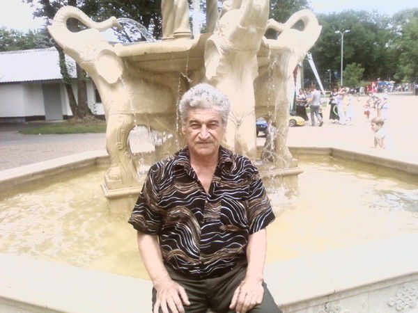 Олег Кучмезов