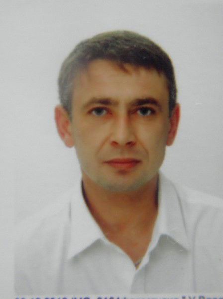 Александр Олейников