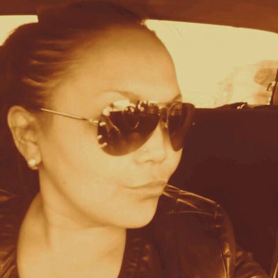 Оля Романова