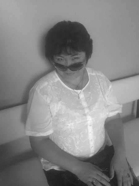 Жанар Кизатова