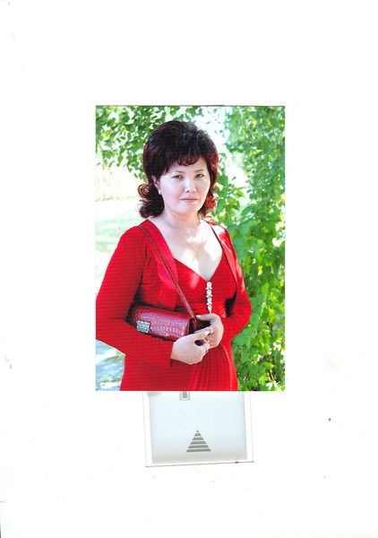 Менслу Токтаулова