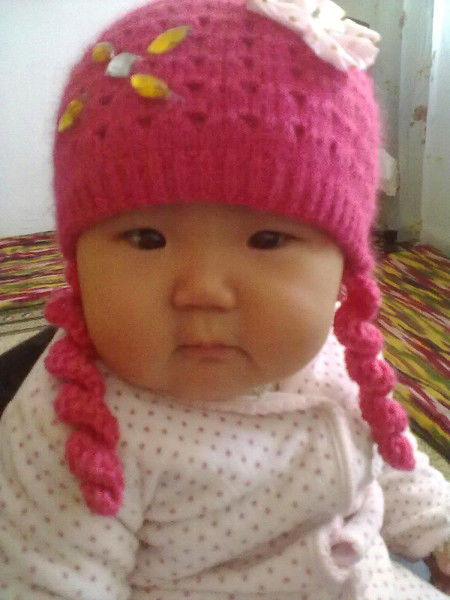 Мадина Омокеева