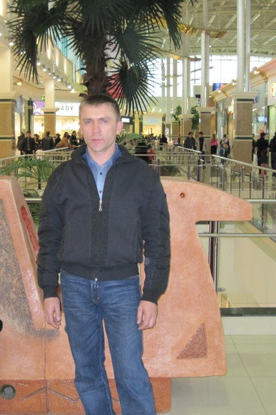 Олег Попов