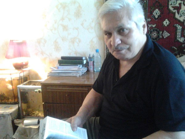 Равшан Исамутдинов