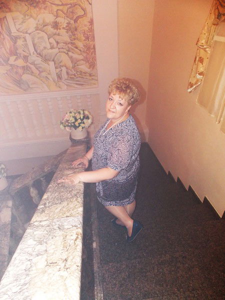 Оля Минакова