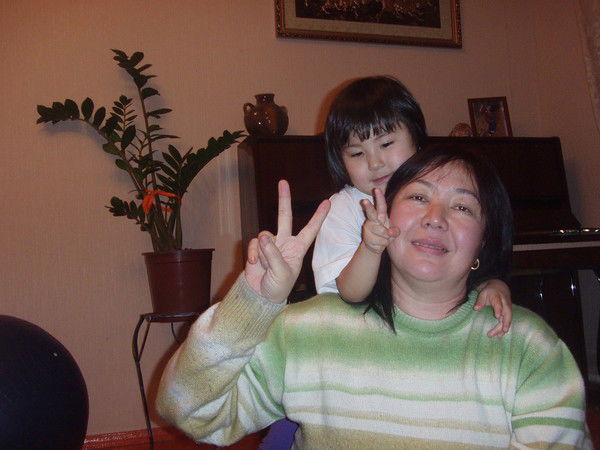 Алма Искакова