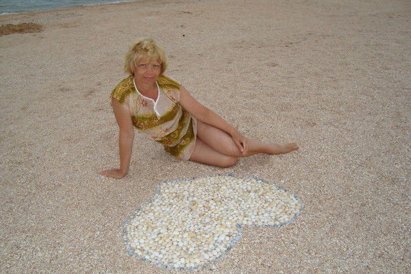 Ольга Белуженкова