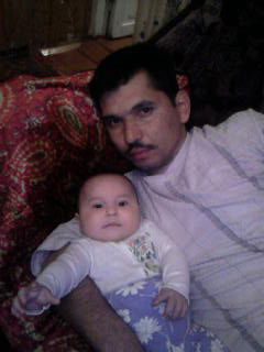 Алишер Холмухамедов