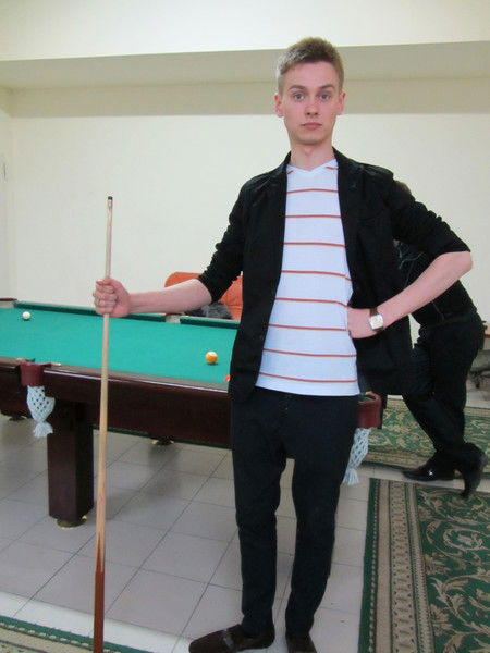 Роман Буната