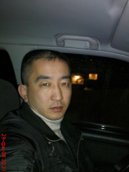 Александр Цай