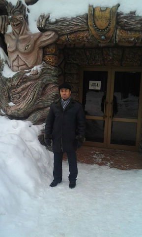 Улугбек Холиков