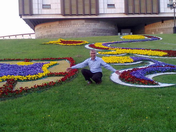 Олим Махмудов