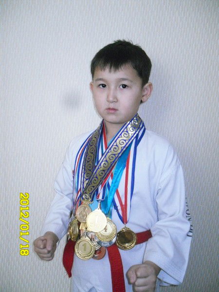 Назым Жомартова