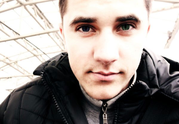 Александр Белан