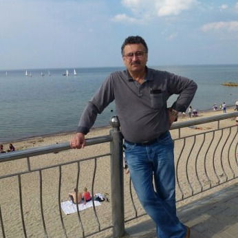 Равель Муллагалиев