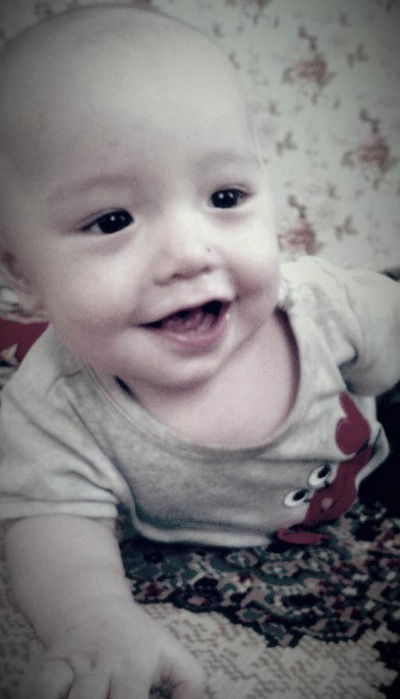 Лаура Шоланбаева