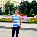 <<Роман >>