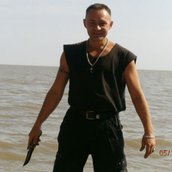 Александр Лютый