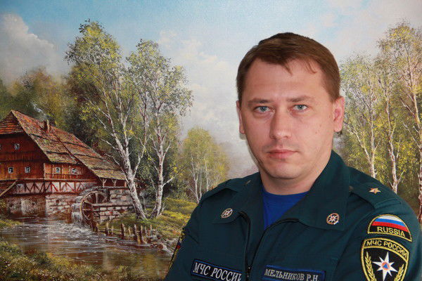 Роман Мельников