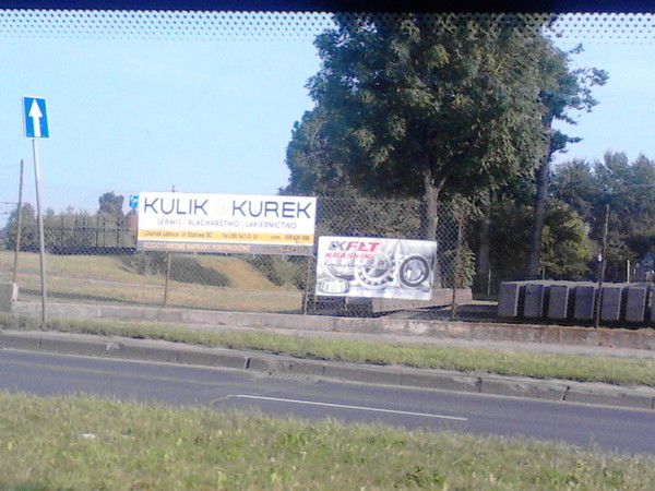 Роман Курек