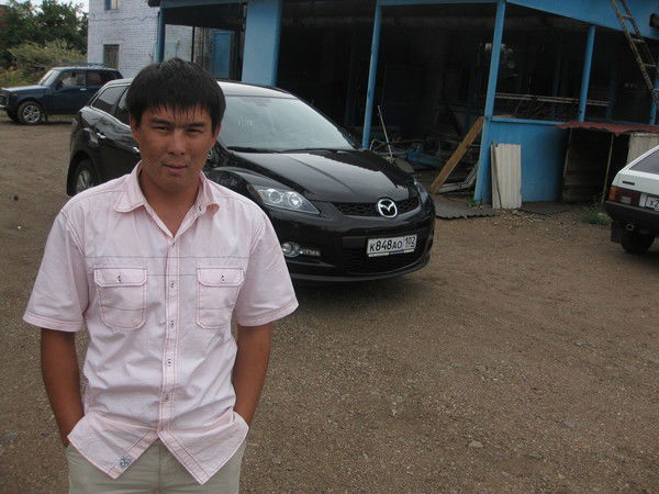 Роман Бисенов