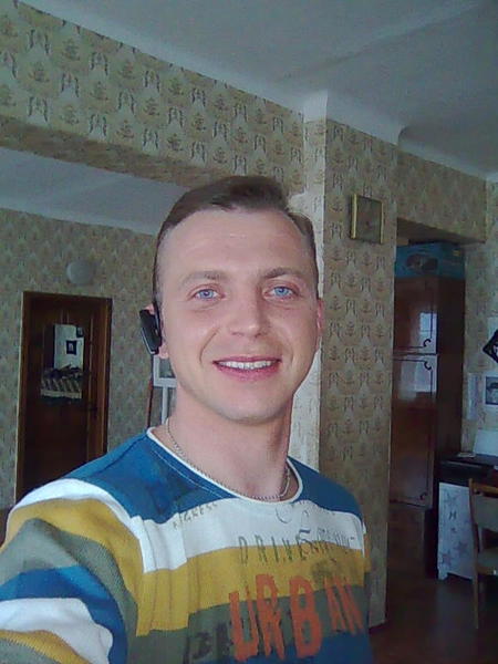 Роман Олейник