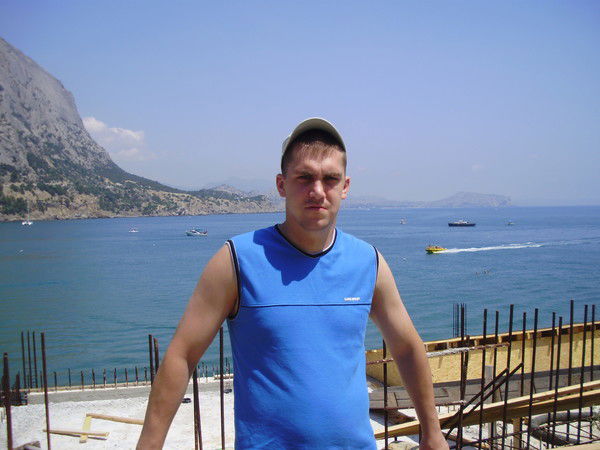 Олег Комарцев