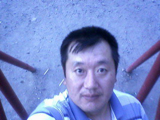 Евгений Цай