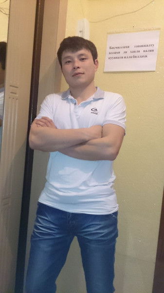 Эрлан Карымшаков