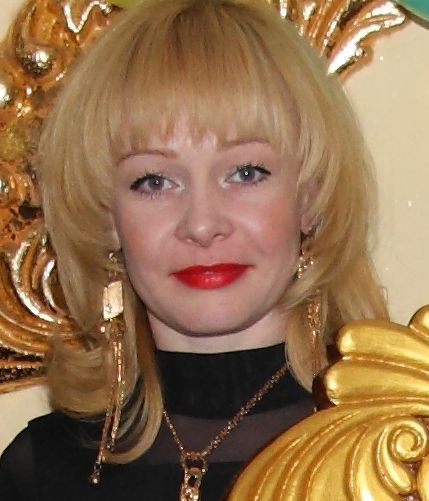 Мила Поникаровская