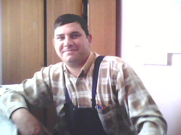 Миша Олейник