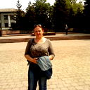 Анютка @-}}