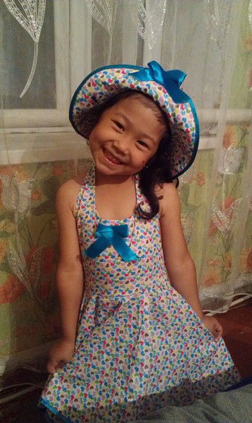 Риза Кусаинова