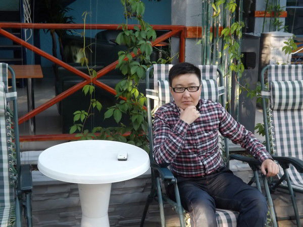 Рахат Какембай