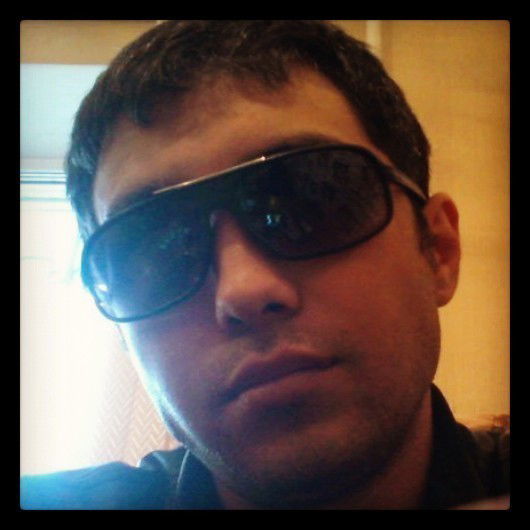 Рустам Томаз