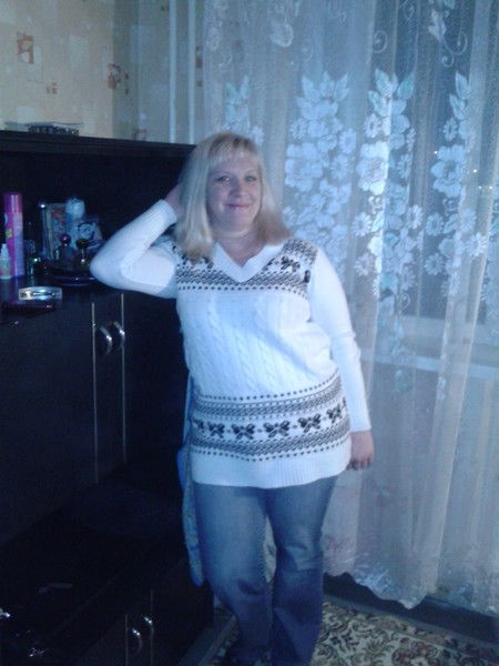 Елена Комина