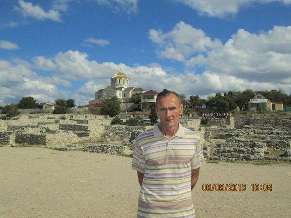 Александр Томилин