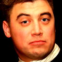 Роман Е