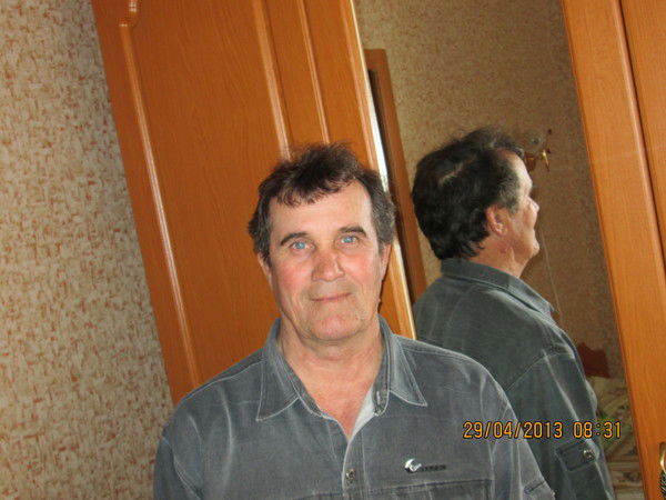 Александр Искаков