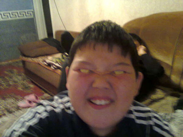 Уали Газизов