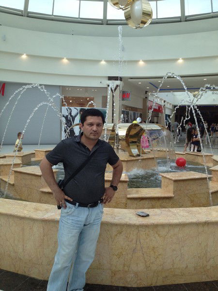 Алишер Пулотов