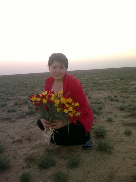 Асель Жанузакова