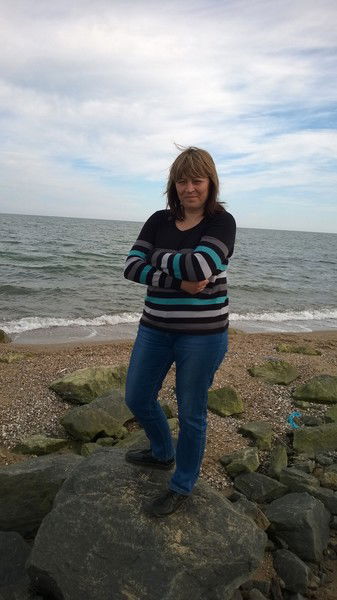 Оля Микельки