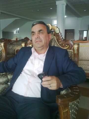 Алишер Курбоналиев