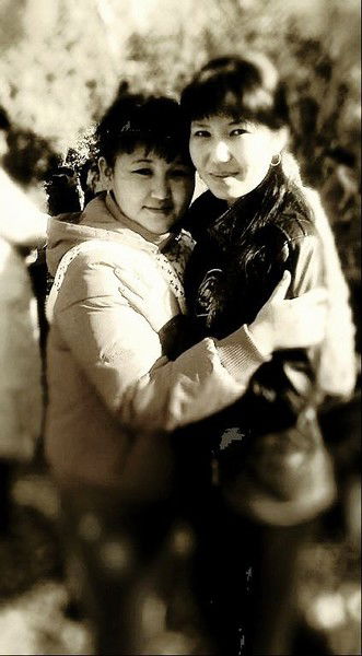 Айгуль Оспанова