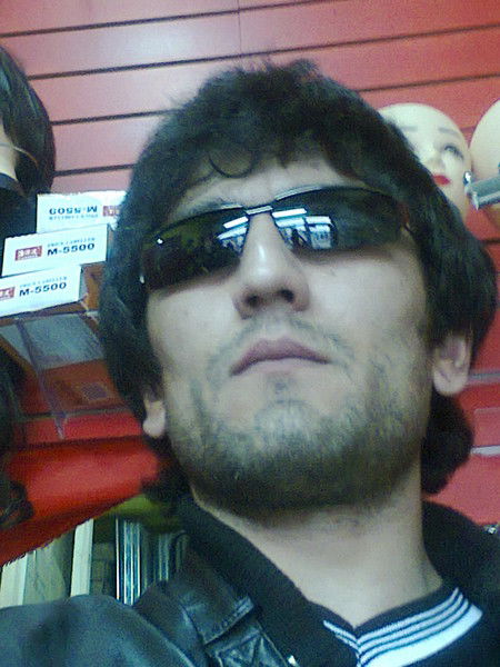 Алишер Шарипов