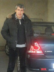 Алам Магзумов